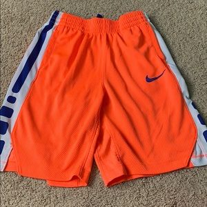Neon orange and purple Nike elite shorts